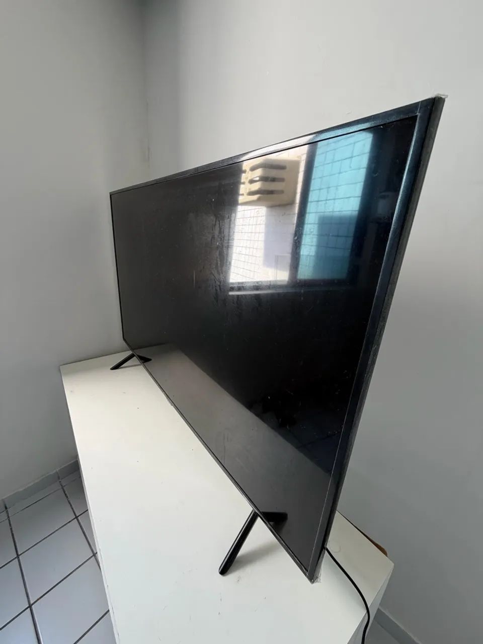 TV 55 polegadas com defeito 