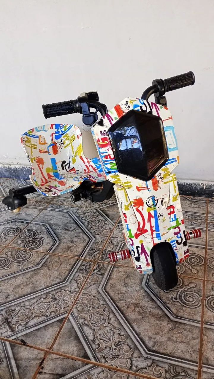 Triciclo elétrico drift infantil 