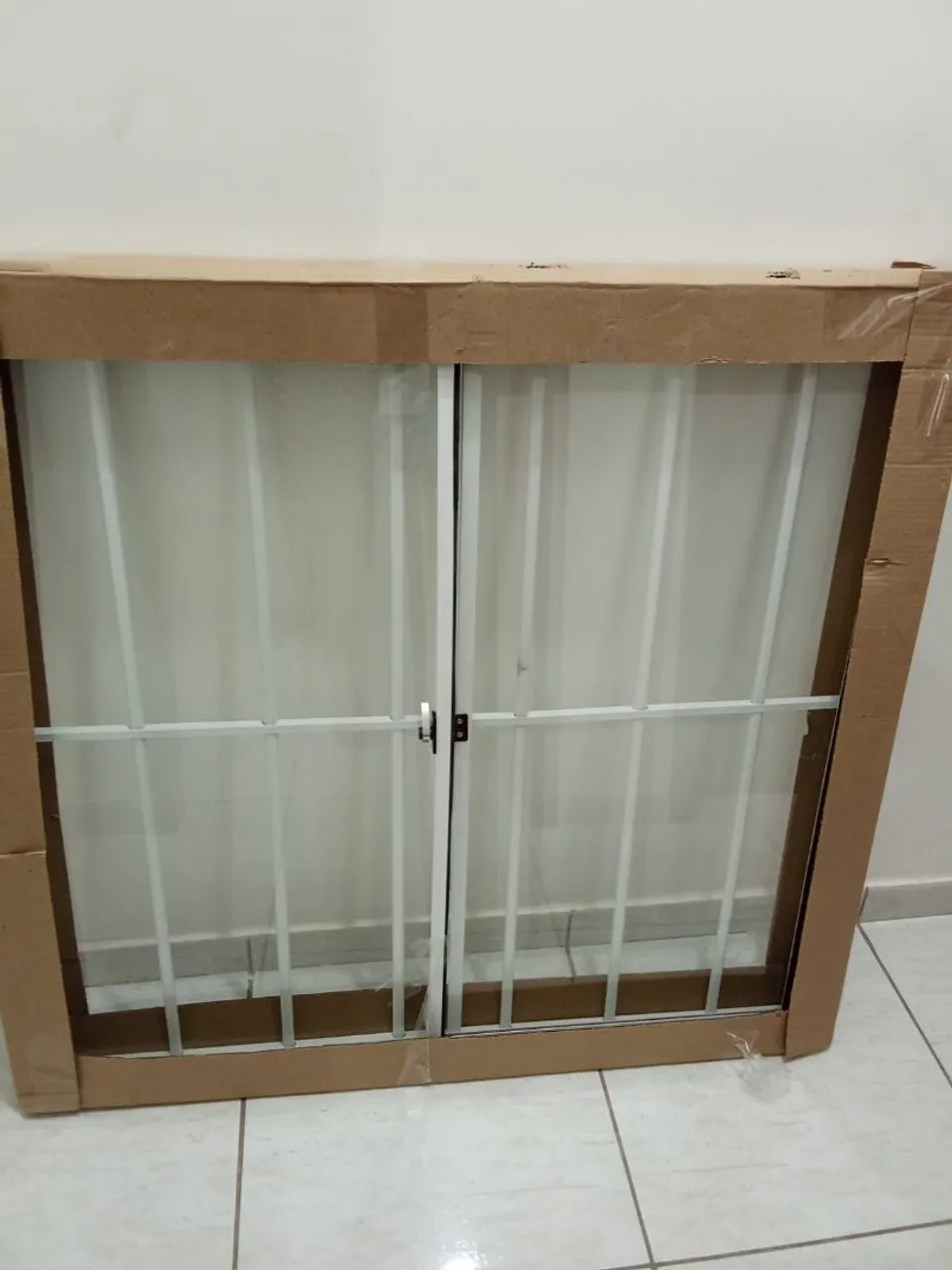 Janela com Grade de Proteção