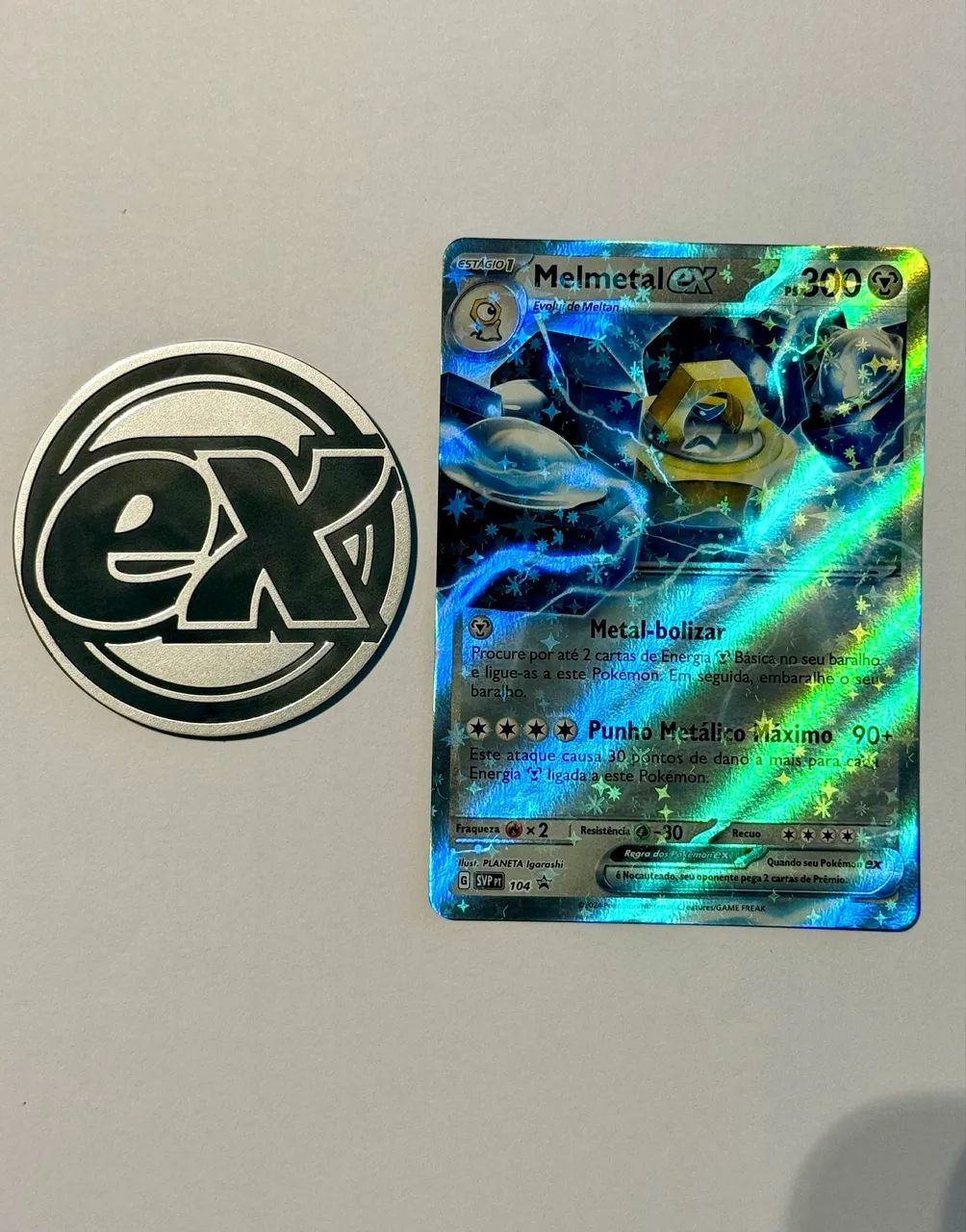 Cartas Pokémon cadeia de evolução MELMETAL com moedas