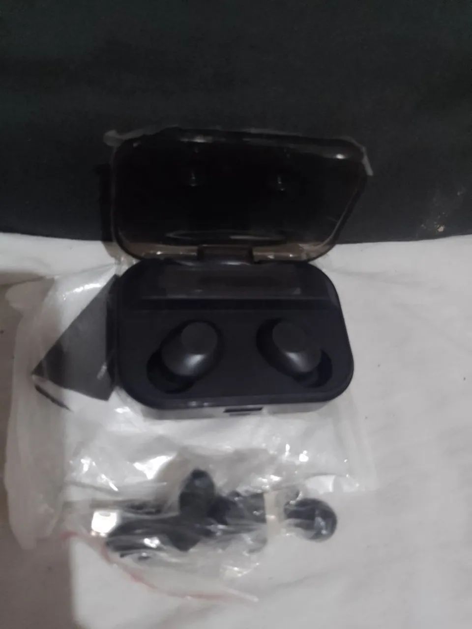 FONE TG02 carregamento Cel 