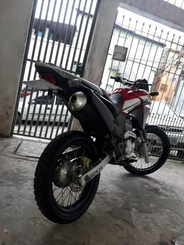 Suporte de placa para XRE