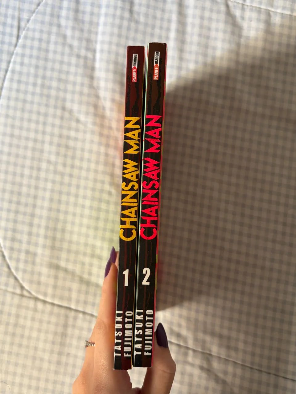 mangás chainsow man volumes 1 e 2 - Foto 2