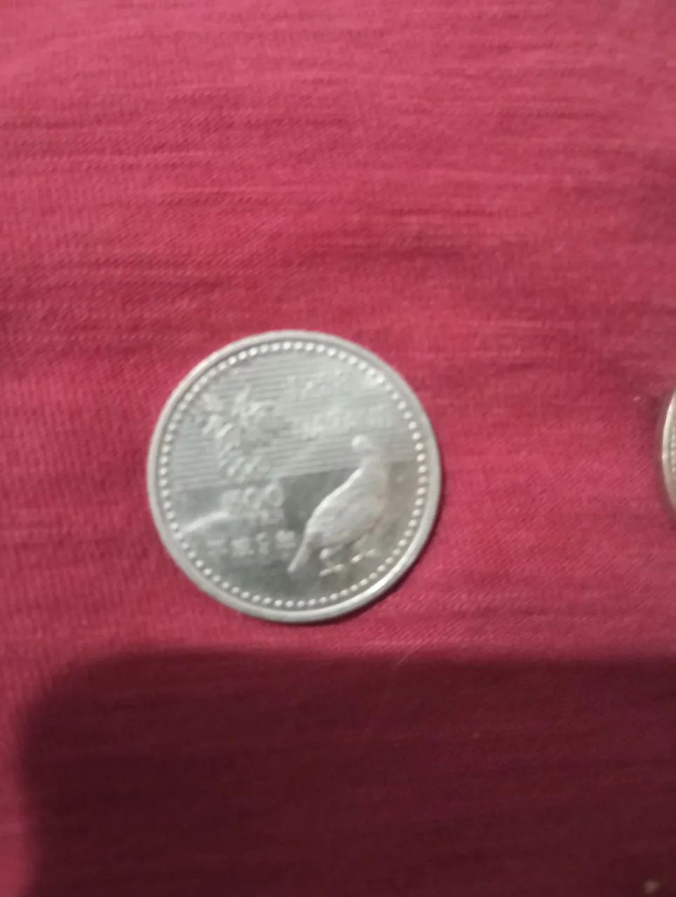 Moedas com defeito e antiga