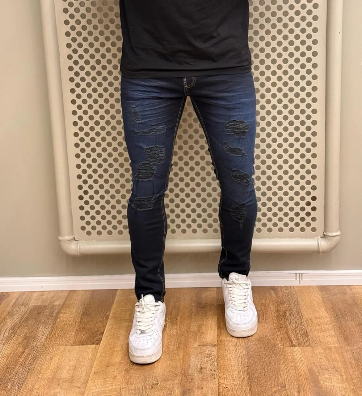 Calça Jeans Masculina rasgada jogador
