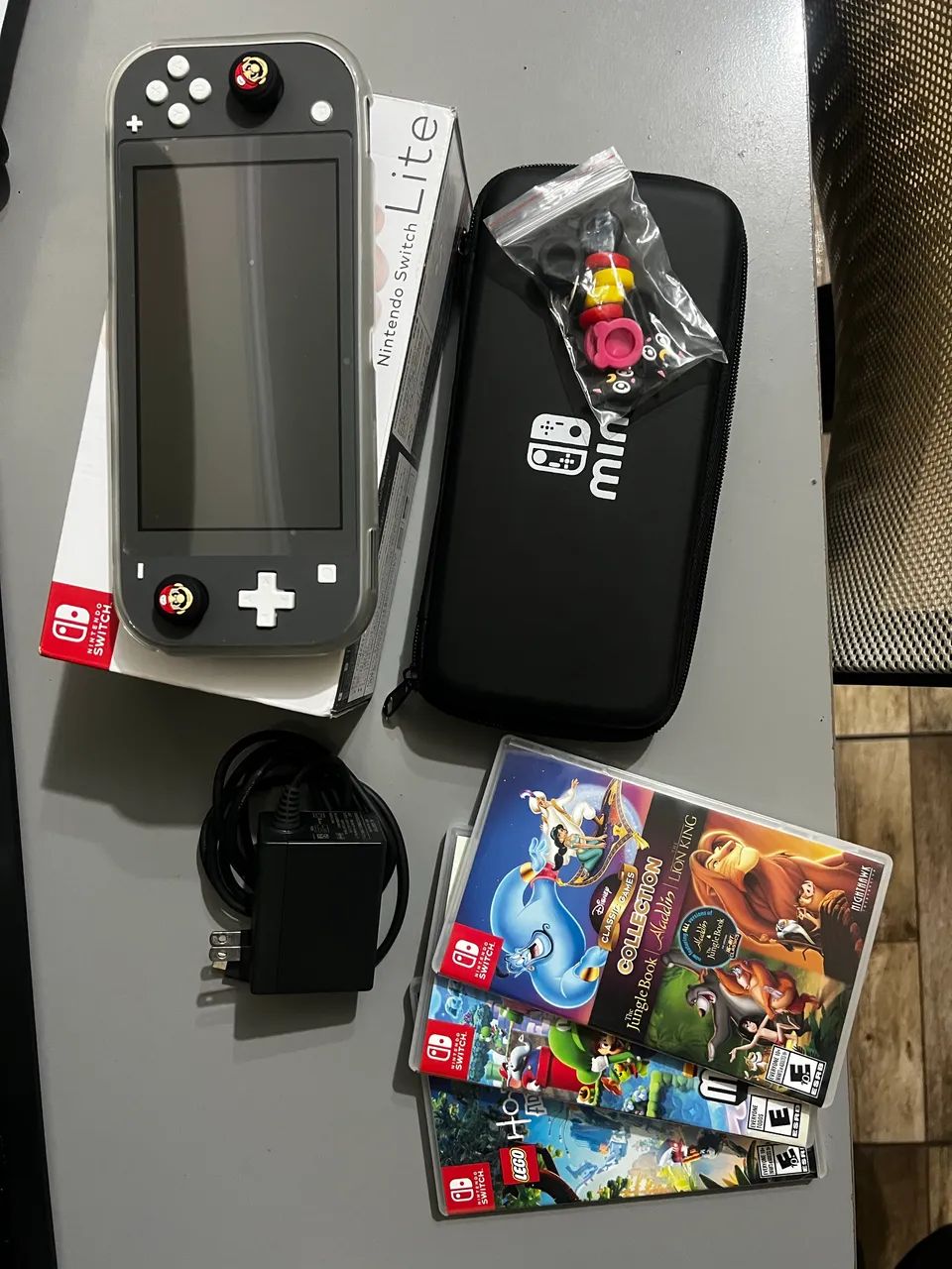 Nintendo Switch Lite Cinza + 3 jogos originais - Consoles de Vídeo