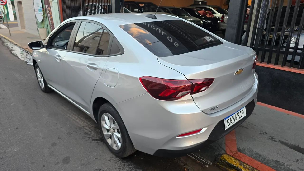 Onix Plus LTZ 2020 completo mylink baixo km - Foto 7