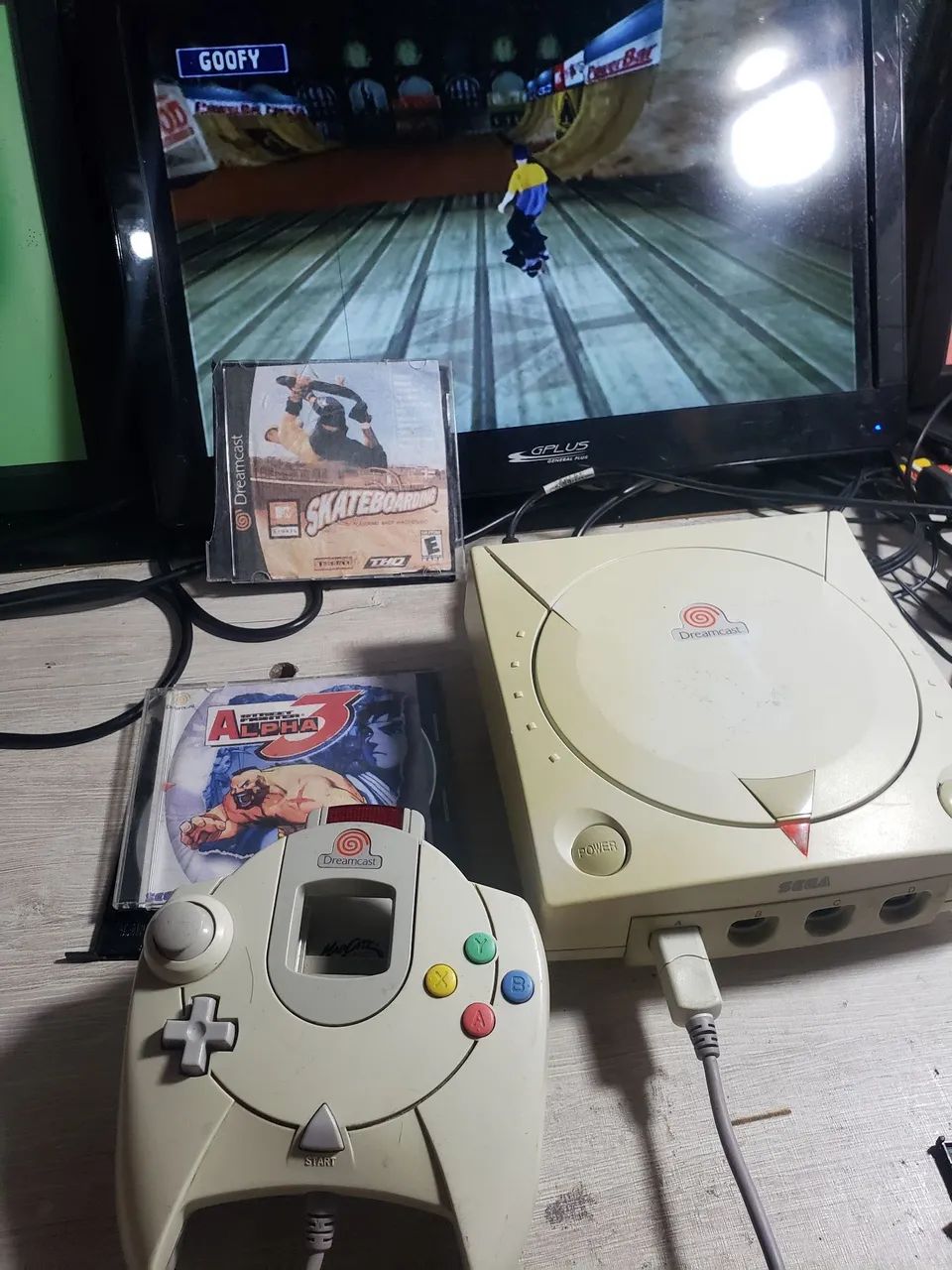 Dreamcast com controle e jogos