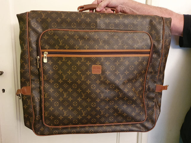 Porta terno Louis Vuitton