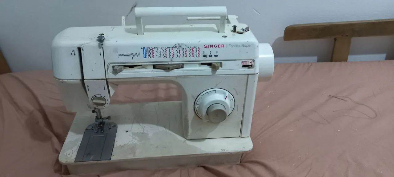 Máquina de costura singer