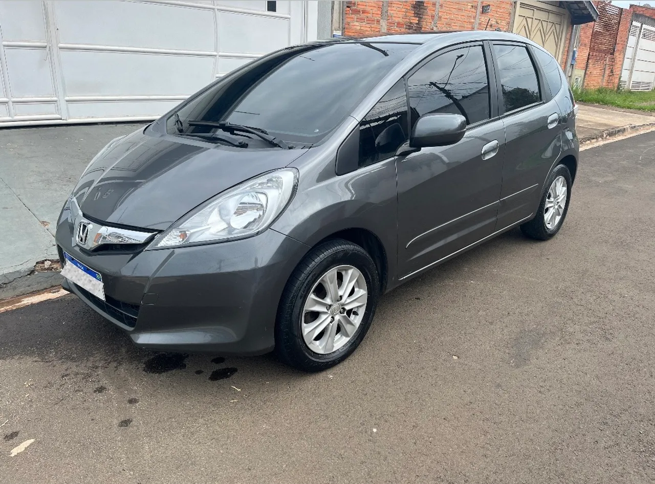 Fit 1.4 2013 automático (baixo km)