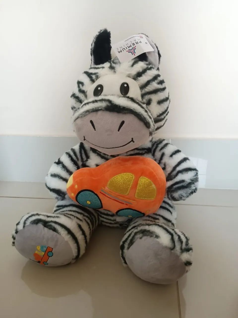 Boneco de pelúcia zebra com carrinho 40cm