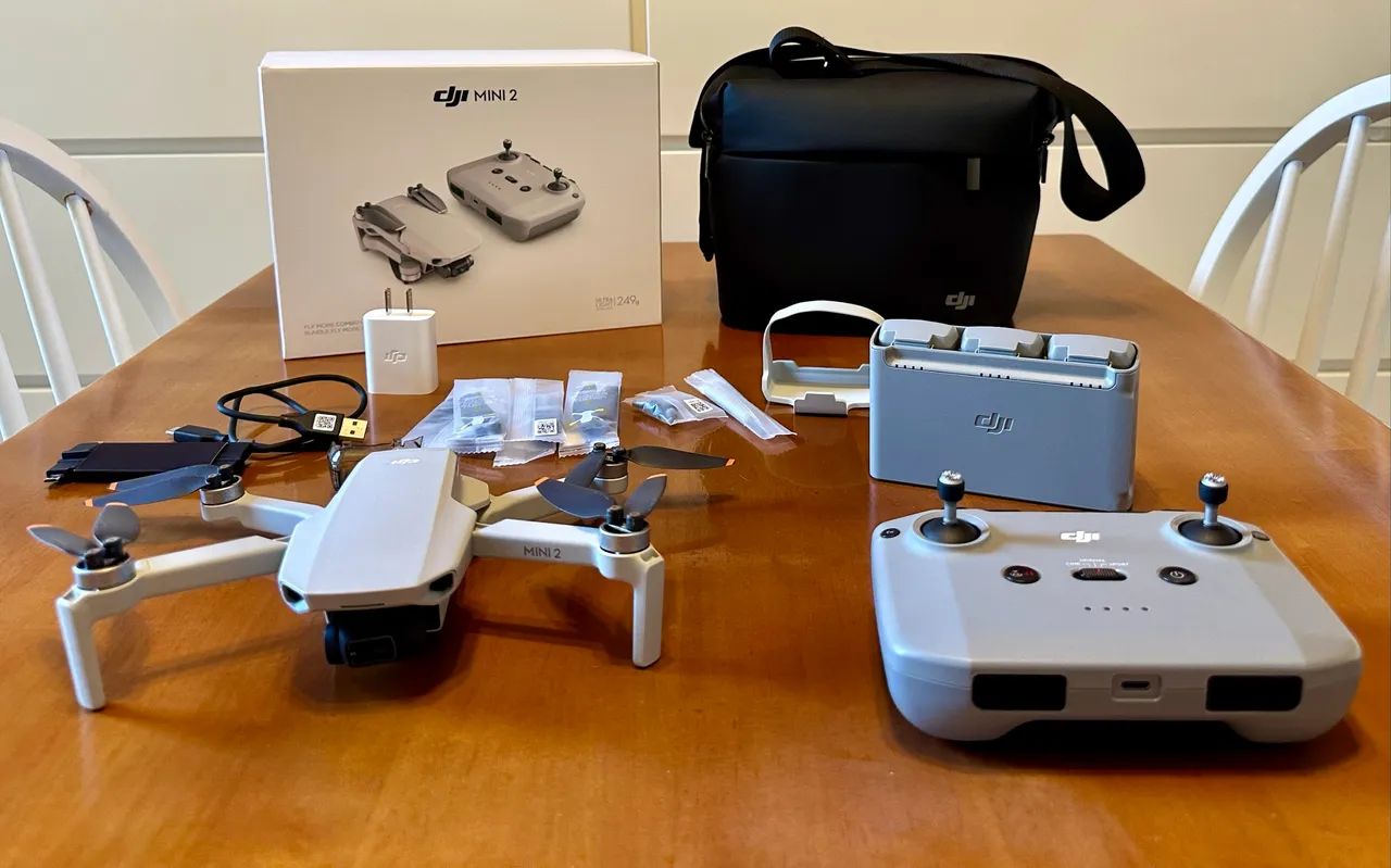DJI mini 2 fly more combo (com carregador original DJI) - Drones