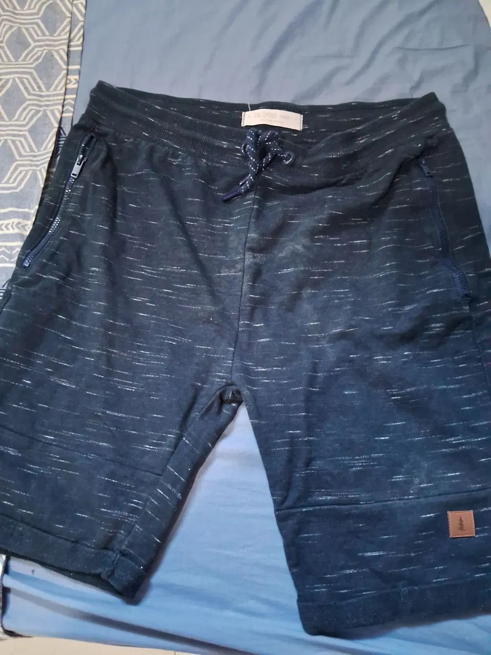 Bermudas menino vesti um 10 anos