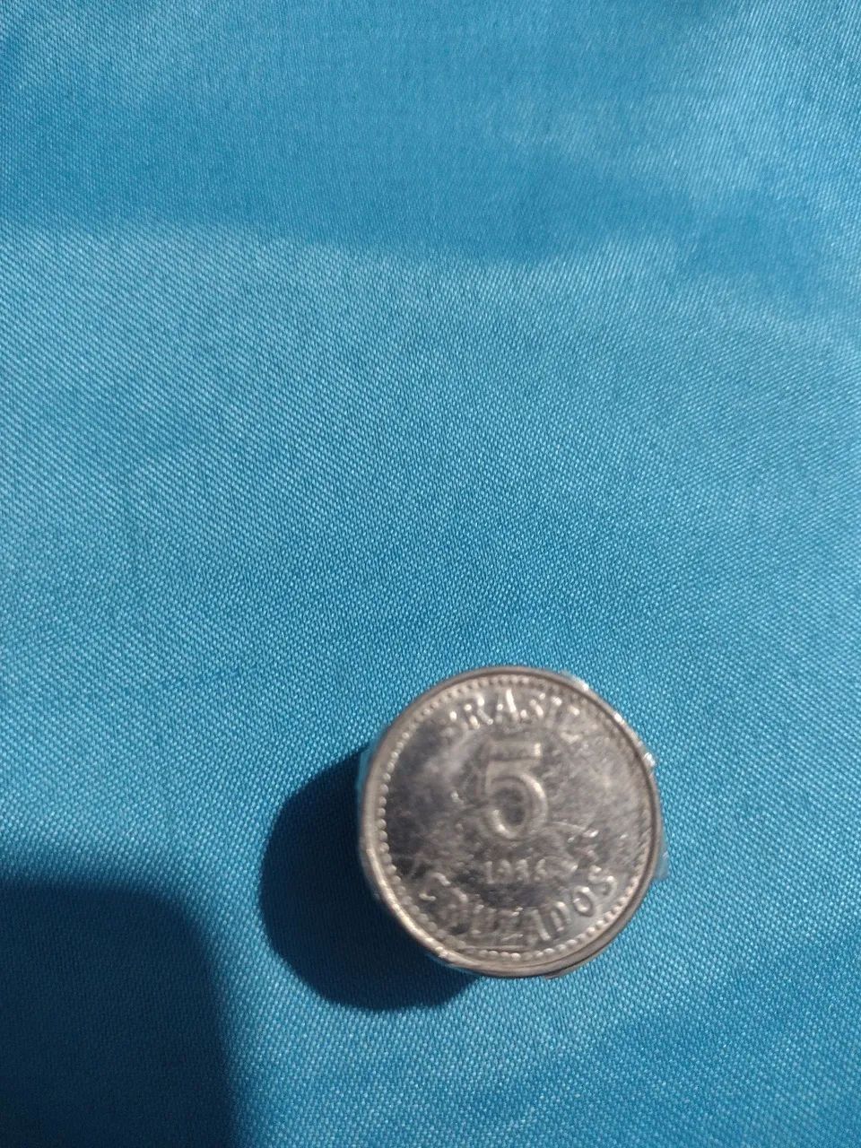 12 moedas de 5 cruzados do ano 86,87 e 88.