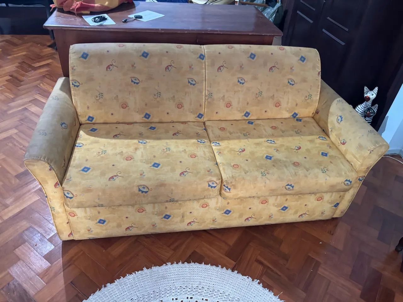 Sofá cama com a base de ferro