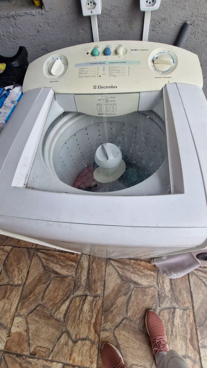 Máquina de lavar com defeito 