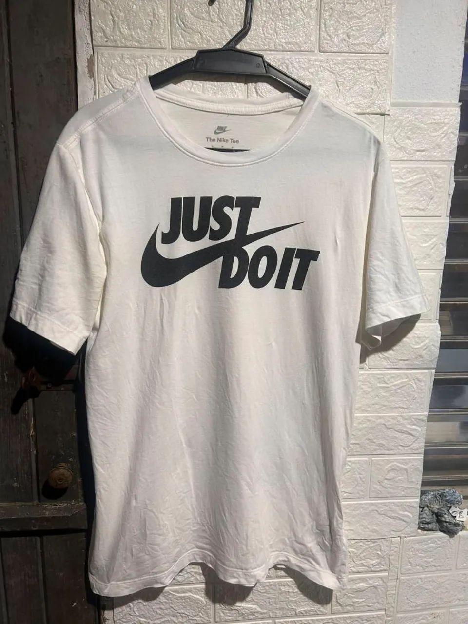 Camiseta da Nike, duas por 100