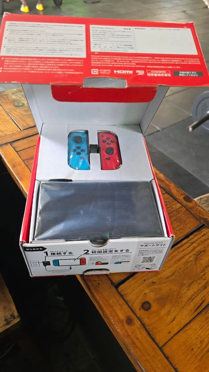 NINTENDO SWITCH OLED NA  CAIXA COM ACESSÓRIOS  - Foto 2