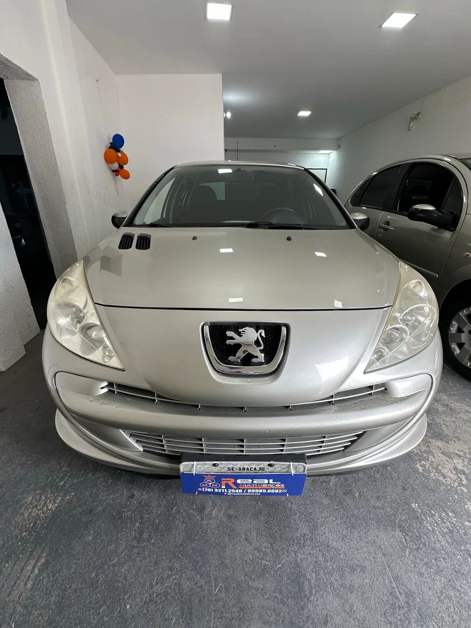 Peugeot 207 207 Sedan Passion XR 1.4 Flex 8V 4p 2012
