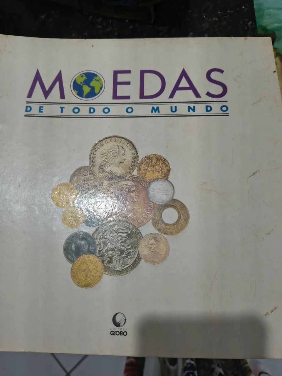 Livro de colecionador de moedas