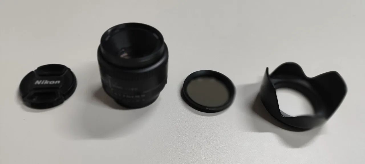 Lente Nikon 50mm F/1.8 D com acessórios  - Foto 5