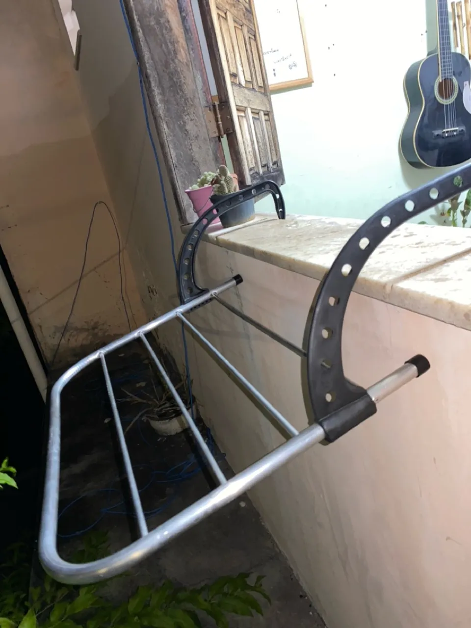 Varal de janela portátil
