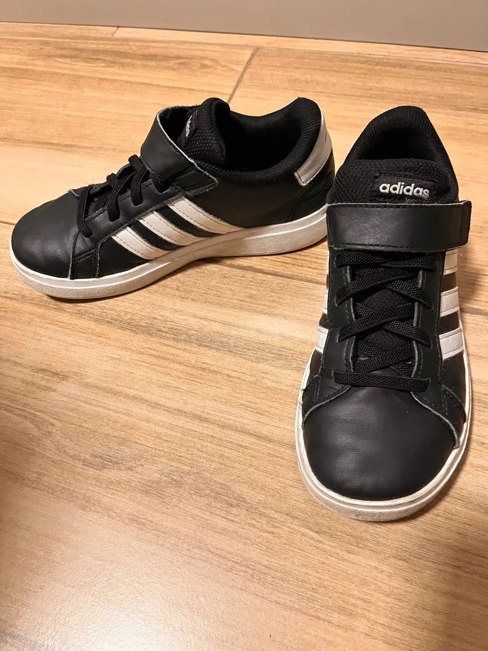 Selling children's Adidas sneakers