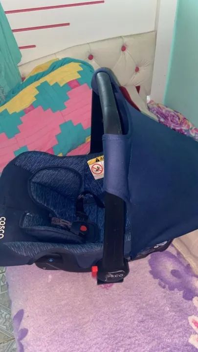 Bebê conforto da marca Cosco 