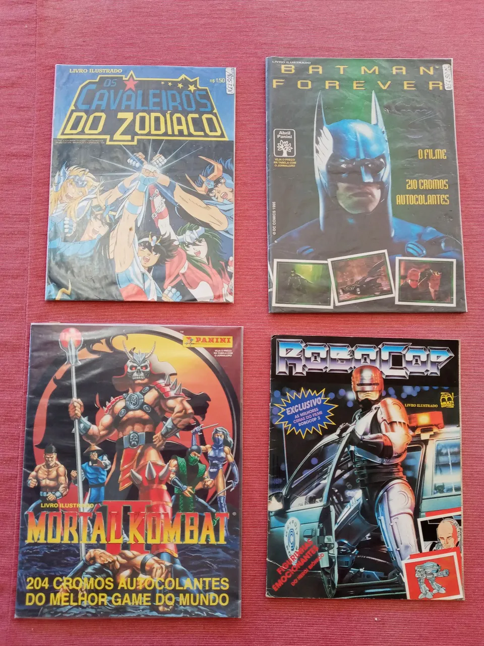4 albuns raros completos Mortal kombat, Cavaleiros Zodiacos, Robocop e Batmam
