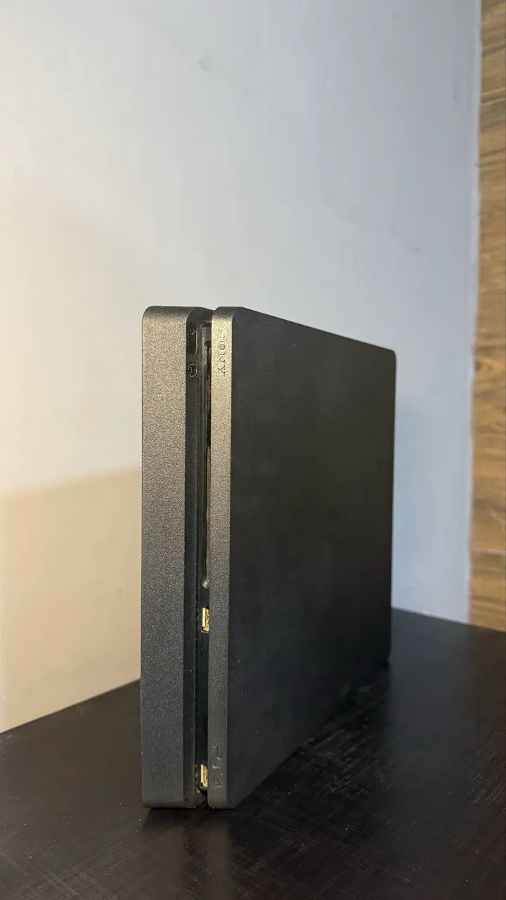 PS4 Slim - 1TB + 2 Jogos  - Foto 4