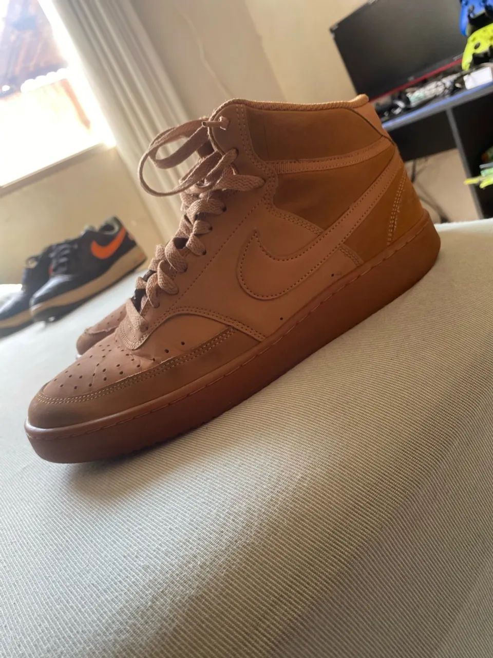 Tênis Nike bege