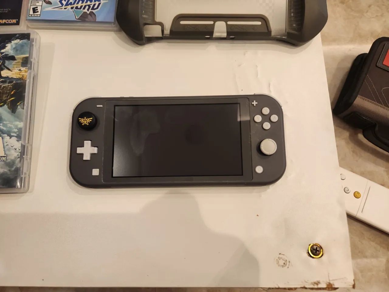 Nintendo Switch Lite cinza + 5 jogos e acessórios. Original tudo
