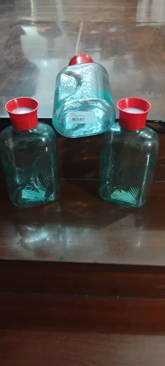 Conjunto de garrafas de vidro decorativas
