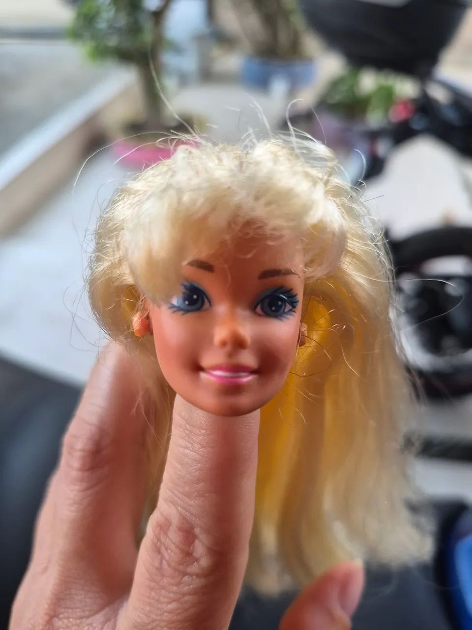 Cabeça de Barbie estrela década 90 