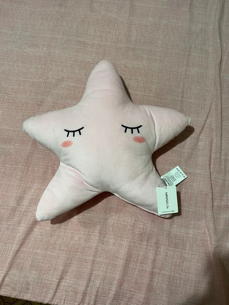 Almofada de estrela rosa 