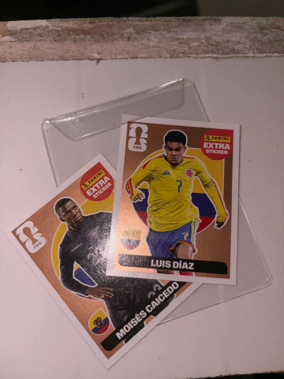 2 Figurinhas Extra Legend Bronze (Moisés Caicedo e Luis Diaz) 