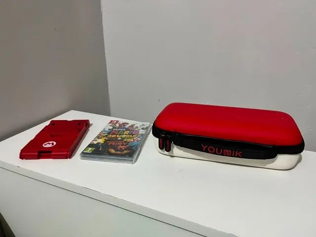  Nintendo Switch V1 completo + Pro Controller + Mario 3D World + Acessórios  - Foto 2