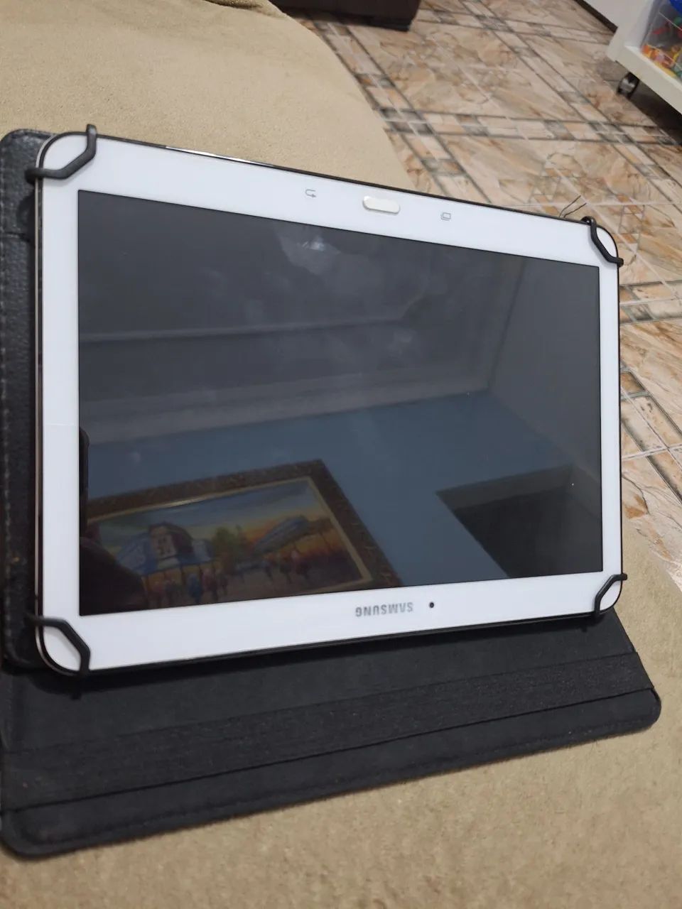 Tablet Samsung 10 polegadas modelo SM T530 com defeito