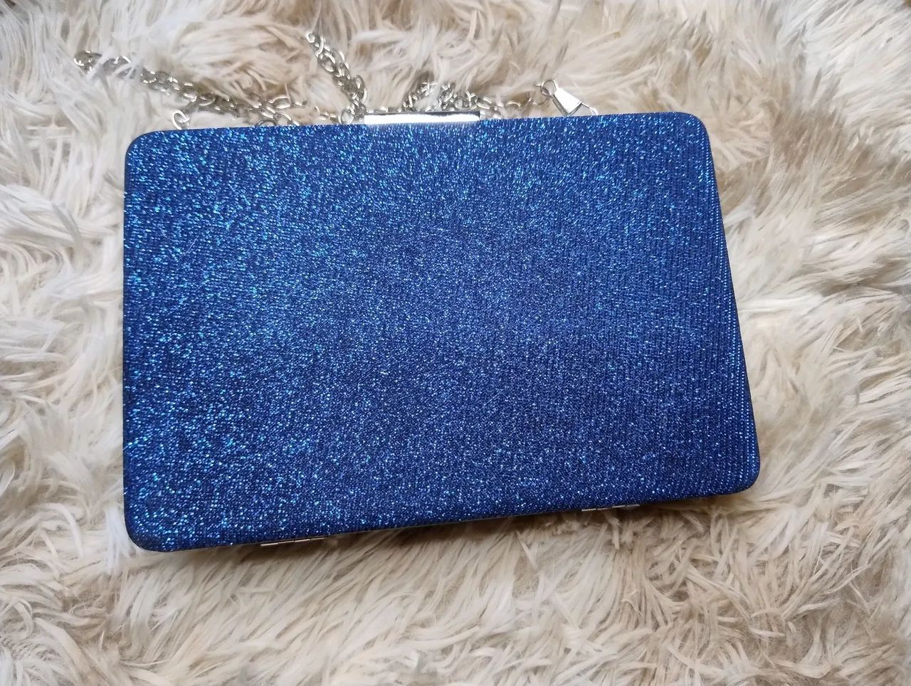 Bolsa de mão azul com glitter