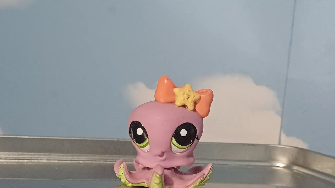 polvo roxinho littlest pet shop