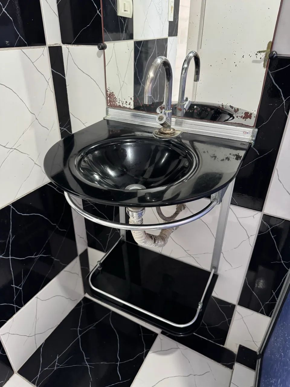 Bathroom sink (If you'd like, you can take everything — sink, faucet, mirror)
