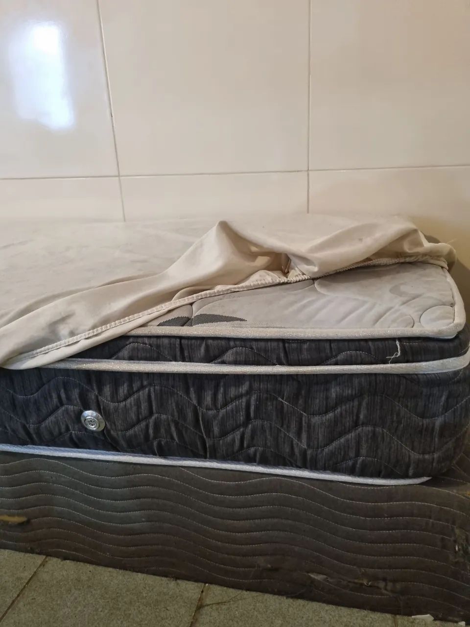Cama Ortobom com molas solteiro