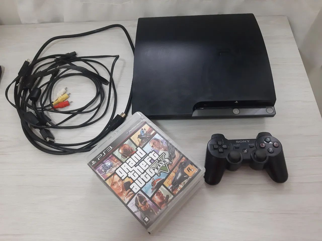 PS3 Slim C/ Jogos