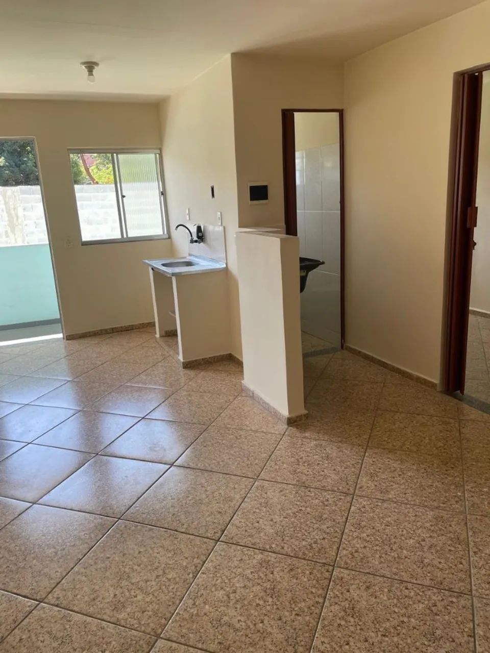 Casa geminada na Taquara rua tranquila