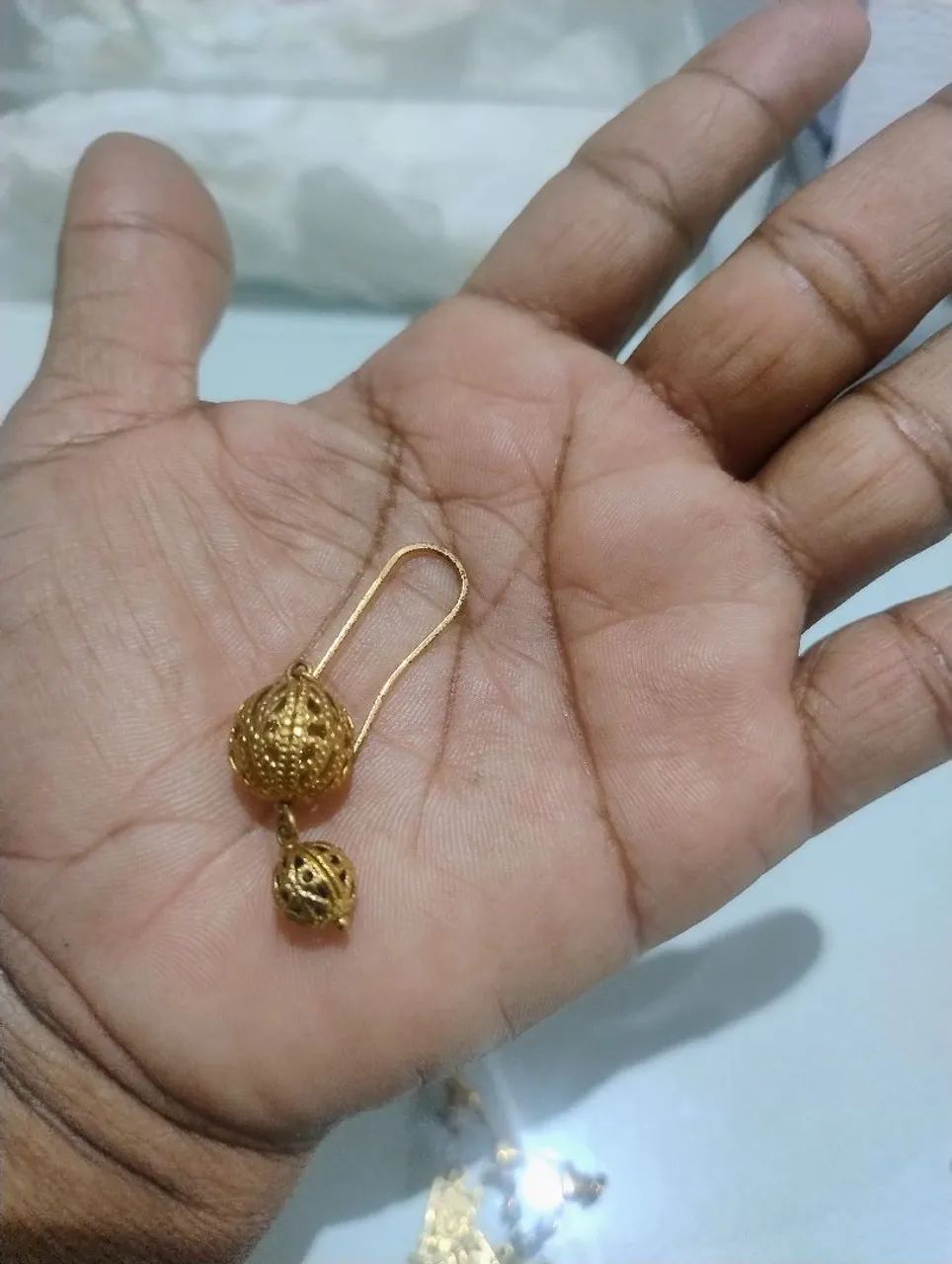 Um brinco é um pingente  - Foto 2