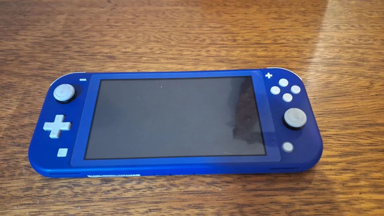 Nintendo Switch Lite Azul + Cartão SSD - Foto 2