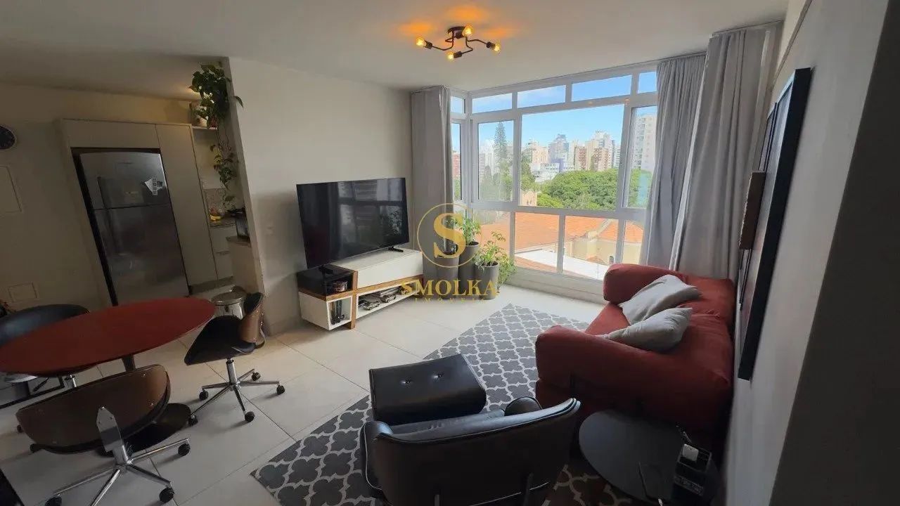 Apartamento mobiliado à venda, com 2 dormitórios, sendo 1 suíte, 2 vags de garagem e 1 hob