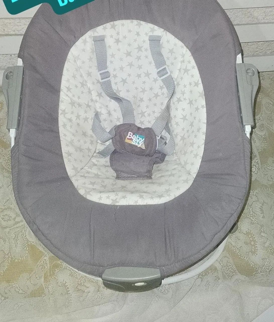 Cadeirinha que vibra , balança e toca 