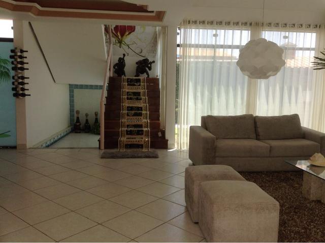 Casa de vidro de frente para o mar - Foto 11